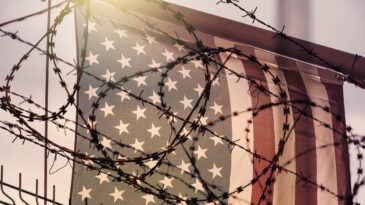 American flag and barbed wire, USA border